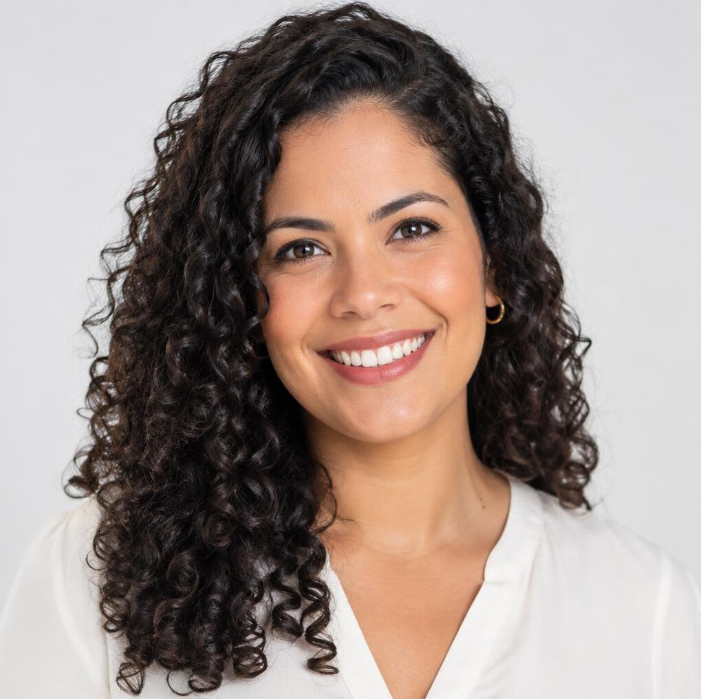 Studio portrait of a brazilian woman with a warm smile